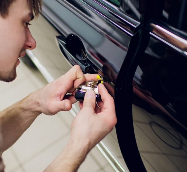 A,Man,Hands,Repair,Left,Door,Car,Locks,Repair,Man